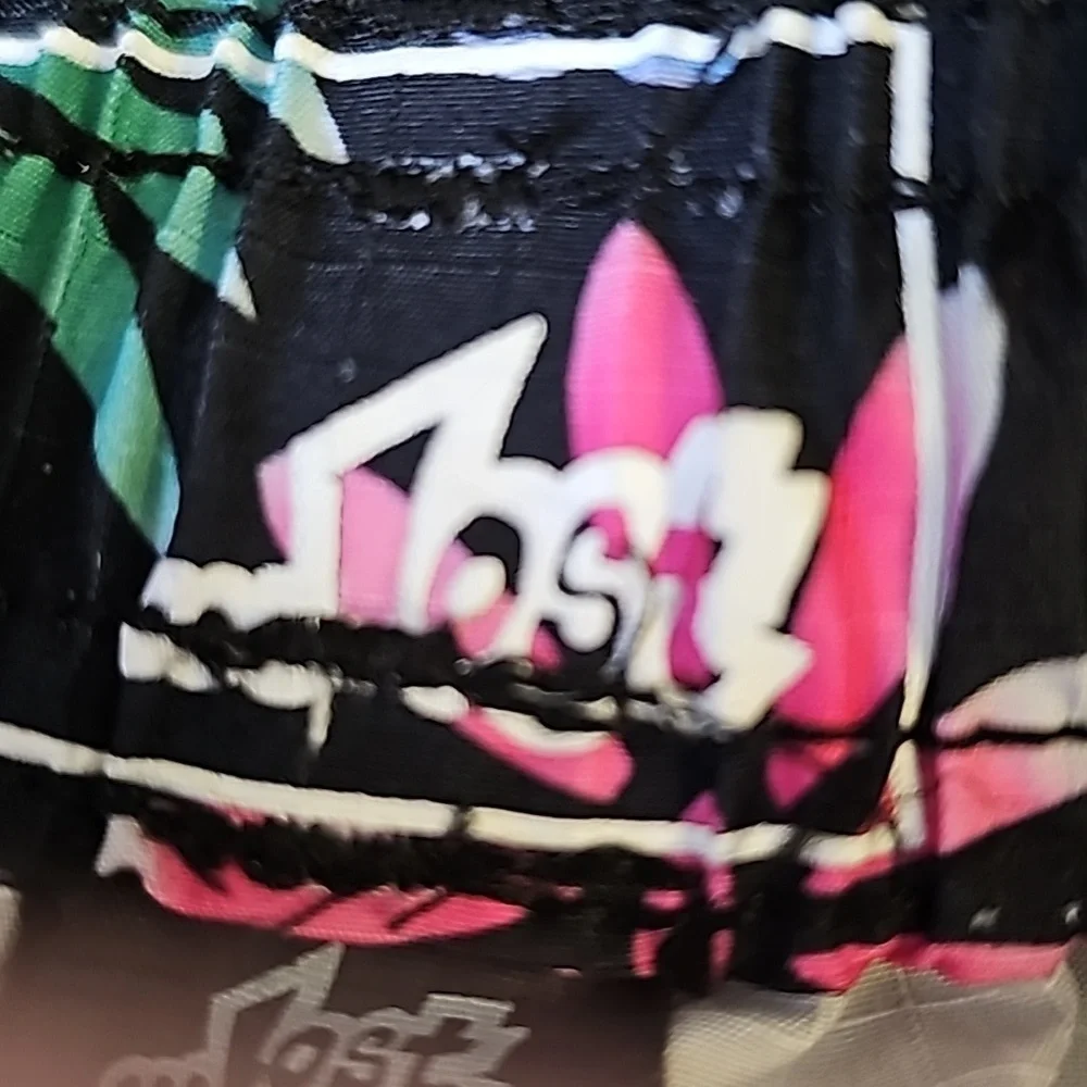 Shorts by Lost. Colorful size medium. 2 front‎ pockets, 1 button pocket …